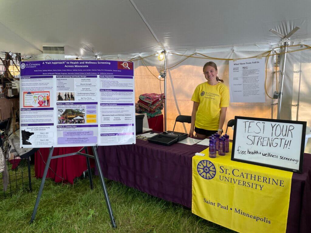 Jordyn Grotbo (St. Catherine University) promoting health and wellness and conducting research at the Hennepin County Fair.